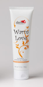 A tube of lotion with the words " warm love ".